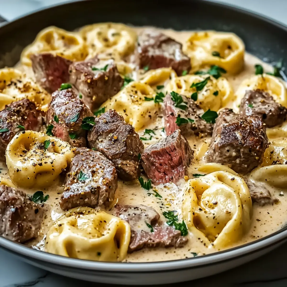 Creamy Garlic Steak Tortellini Skillet Dinner